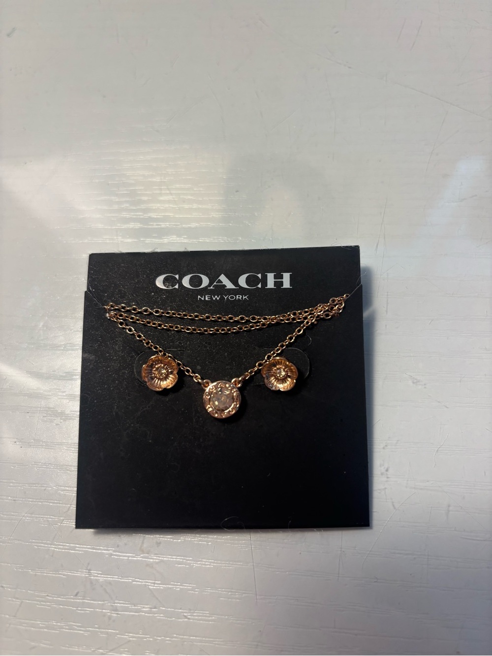 Coach Rose Gold Flower Pendant Necklace with earrings set.